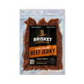 Clear bag of Brisket Chips Co. Thin Crispy Beef Jerky, Mild Spicy flavor.