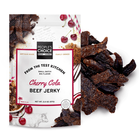 Cherry Cola Beef Jerky package with beef jerky pieces on a white background