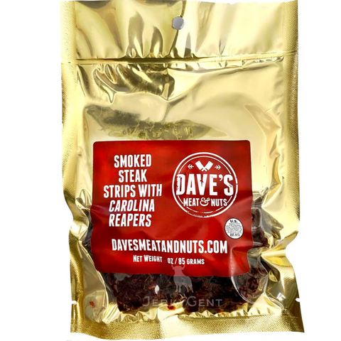 Front of Dave’s Meat & Nuts Smoked Steak Strips with Carolina Reapers in a gold resealable pouch