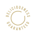 Gold 'Delicousness Guaranteed' logo on a white background