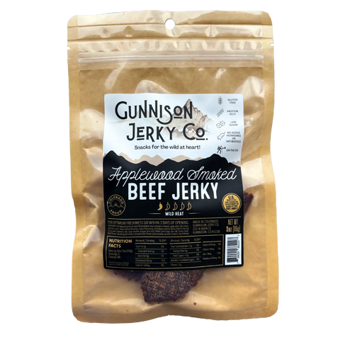 Bag of Gunnison Jerky Co. Applewood Smoked Beef Jerky, mild heat, gluten-free, protein-rich snack made in Colorado.