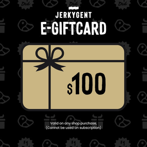 JerkyGent $100 gift card design featuring a gold rectangle with bow graphic on a black patterned background.