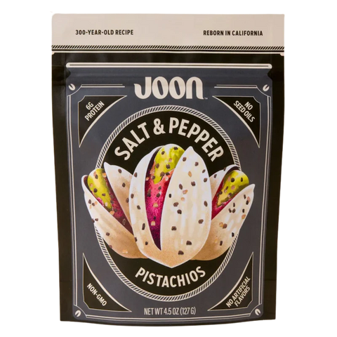 Front of Joon Salt & Pepper Pistachios bag with pistachio illustration and bold black packaging.
