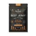 Black bag of Rogue Jerky Bonfire Bourbon flavor with smoky, coffee, and orange notes.