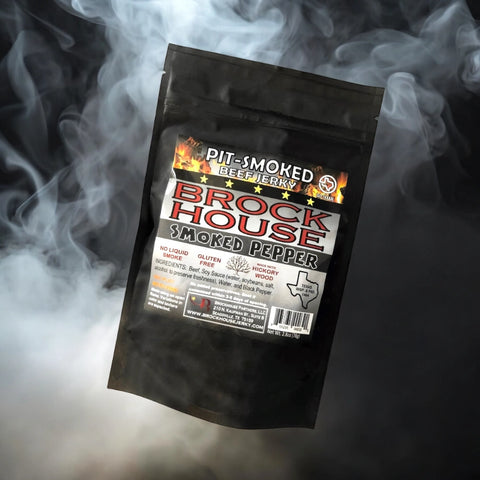 Smoked Beef Jerky with a dark and smoky background.