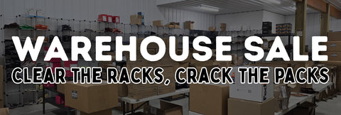Warehouse Sale promotional banner inside a JerkyGent fulfillment space, showing shelves of jerky packs and boxes stacked for shipping. Bold white text reads “WAREHOUSE SALE” with the tagline “Clear the Racks, Crack the Packs” overlayed across the image.