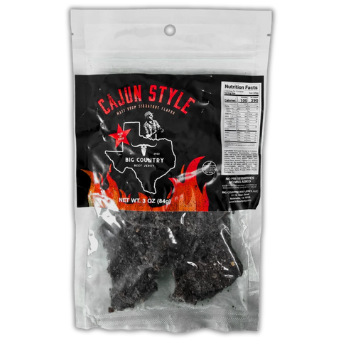Big Country Cajun Style Beef Jerky – bold black packaging with red lettering, Texas-themed design, and fiery graphics. A signature flavor with a spicy Cajun kick, made with high-quality ingredients and no preservatives.