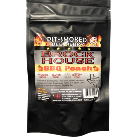 Brockhouse Jerky BBQ Peach Beef Jerky – dark packaging featuring bold 'Brockhouse' branding, flame graphics, and peach imagery, highlighting the hickory-smoked, peach-infused flavor.