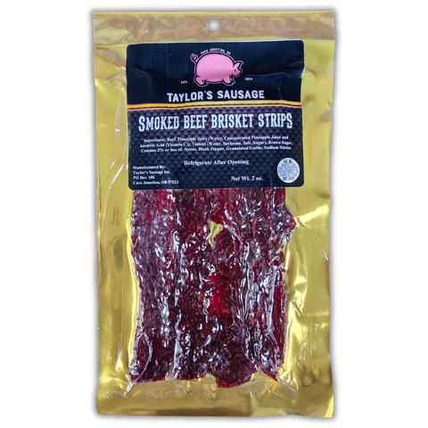 Taylor's Sausage Smoked Beef Brisket Strips – tender, smoky beef brisket jerky. Vacuum-sealed in gold packaging with a clear window showcasing the rich, flavorful jerky.