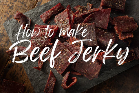 A high-quality photo of some freshly made beef jerky with the text overlay "How to Make Beef Jerky"