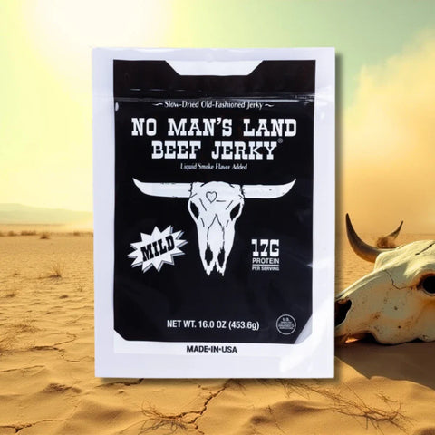 Bag of No Man’s Land Mild Beef Jerky, 16oz pack, slow-dried old-fashioned jerky with 17g protein per serving, displayed in a desert background.