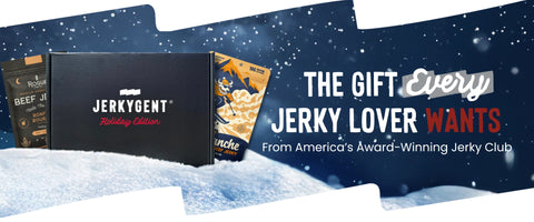 Beef Jerky Gifts Collection banner featuring the JerkyGent Holiday gift box in a pile of snow with the words "The Gift Every Jerky Lover Wants"