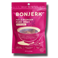 Pink package of BonJerk M¡ó Sichuan Pork Jerky on a white background