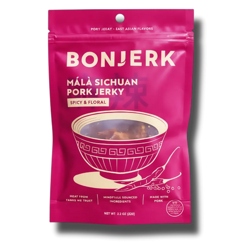 Pink package of BonJerk M¡ó Sichuan Pork Jerky on a white background
