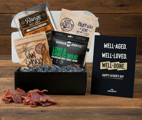 Assorted jerky packages with a 'Happy Father's Day' card on a white background