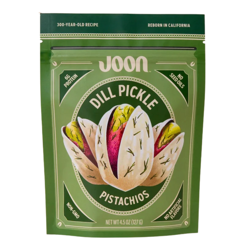 Front of Joon Dill Pickle Pistachios bag featuring vibrant green packaging and dill-seasoned pistachio illustration.