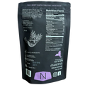Back of Nat’s Nuts Toasted Coconut Cashews pouch showing ingredients, nutrition facts, and branding details.