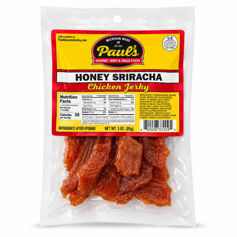 Packaged honey sriracha chicken jerky with Paul's Gourmet Jerky & Snack Sticks label on a white background