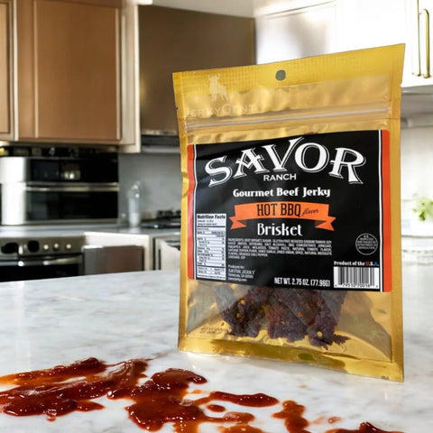 Savor Ranch Hot BBQ tender brisket jerky in a kitchen with BBQ sauce