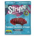 Stryve protein snack package with thinly sliced steak on a blue background