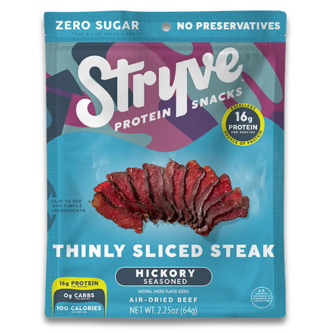 Stryve protein snack package with thinly sliced steak on a blue background