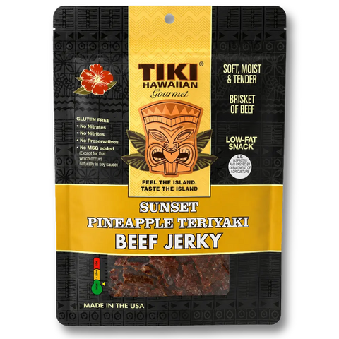 A package of Tiki Hawaiian Gourmet Sunset Pineapple Teriyaki Beef Jerky, featuring a black and yellow resealable pouch with a clear window showing the jerky inside.