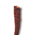 Close up of peoples choice beef jerky gochujang flavor showing the texture and deep red color.