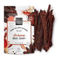A bag of peoples choice beef jerky gochujang flavor with a pile of beef jerky next to it.