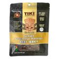 Bag of Tiki Hawaiian Gourmet Sunset Pineapple Teriyaki Beef Jerky, featuring a tropical-themed design with tiki mask, hibiscus flower, and clear window showing tender brisket jerky.