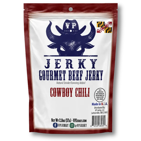 A stand-up pouch of VP Jerky Gourmet Beef Jerky, Cowboy Chili flavor, featuring a white background with a dark red border, a navy blue cowboy silhouette wearing a VP hat, and red text.