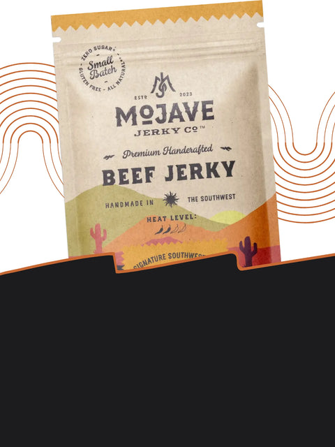 Mojave Jerky Co. Southwest-style beef jerky in a tan pouch with desert landscape art. Features ‘Small Batch’ label and heat scale with five chili icons. Tasting notes: Zesty, Bright, Peppery.