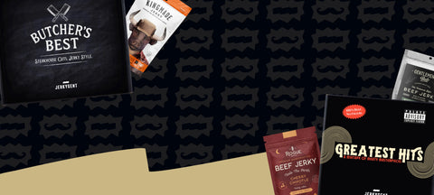 Father's Day-themed JerkyGent hero banner featuring a variety of premium jerky packs, including Butcher's Best, Greatest Hits, Rogue Jerky Co.'s Cherry Chipotle, and Kingmade Jerky. The background features a repeating pattern of mustaches and JerkyGent logo badges, evoking a bold, masculine vibe for the Father’s Day season.