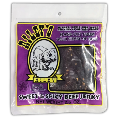 Riley's Jerky Sweet & Spicy – the perfect balance of heat and sweetness, featuring visible chili flakes on tender, hand-cut beef jerky in a purple and yellow package.