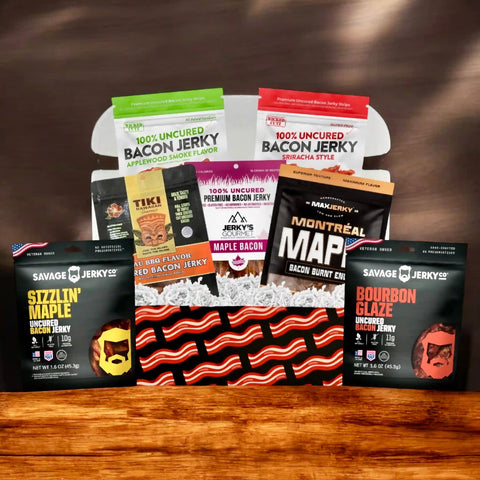 Ultimate Bacon Jerky Gift Box featuring a variety of uncured bacon jerky flavors from top brands, arranged in a bacon-patterned box on a wooden table.